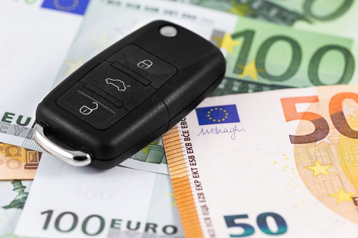 closeup euro money with car key